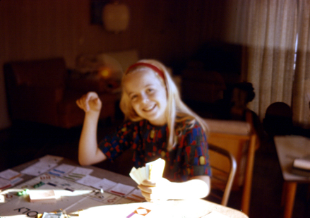 Susan plays Monopoly in the early 1960s